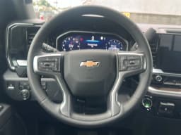 Chevrolet Silverado 1500 LT 4WD Crew Cab 147" 2026 — side view