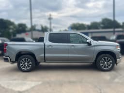 Chevrolet Silverado 1500 LT 4WD Crew Cab 147" 2026 — side view