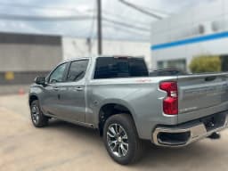 Chevrolet Silverado 1500 LT 4WD Crew Cab 147" 2026 — side view