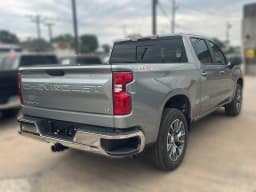 Chevrolet Silverado 1500 LT 4WD Crew Cab 147" 2026 — side view