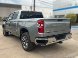 Chevrolet Silverado 1500 LT 4WD Crew Cab 147" 2026 — side view
