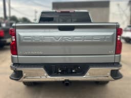 Chevrolet Silverado 1500 LT 4WD Crew Cab 147" 2026 — side view