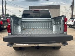 Chevrolet Silverado 1500 LT 4WD Crew Cab 147" 2026 — side view