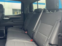 Chevrolet Silverado 1500 LT 4WD Crew Cab 147" 2026 — side view