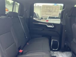 Chevrolet Silverado 1500 LT 4WD Crew Cab 147" 2026 — side view