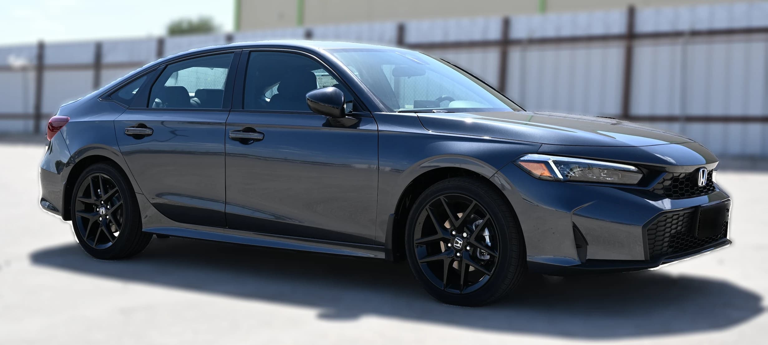 Honda Civic Sedan Hybrid Sport CVT 2026 — side view