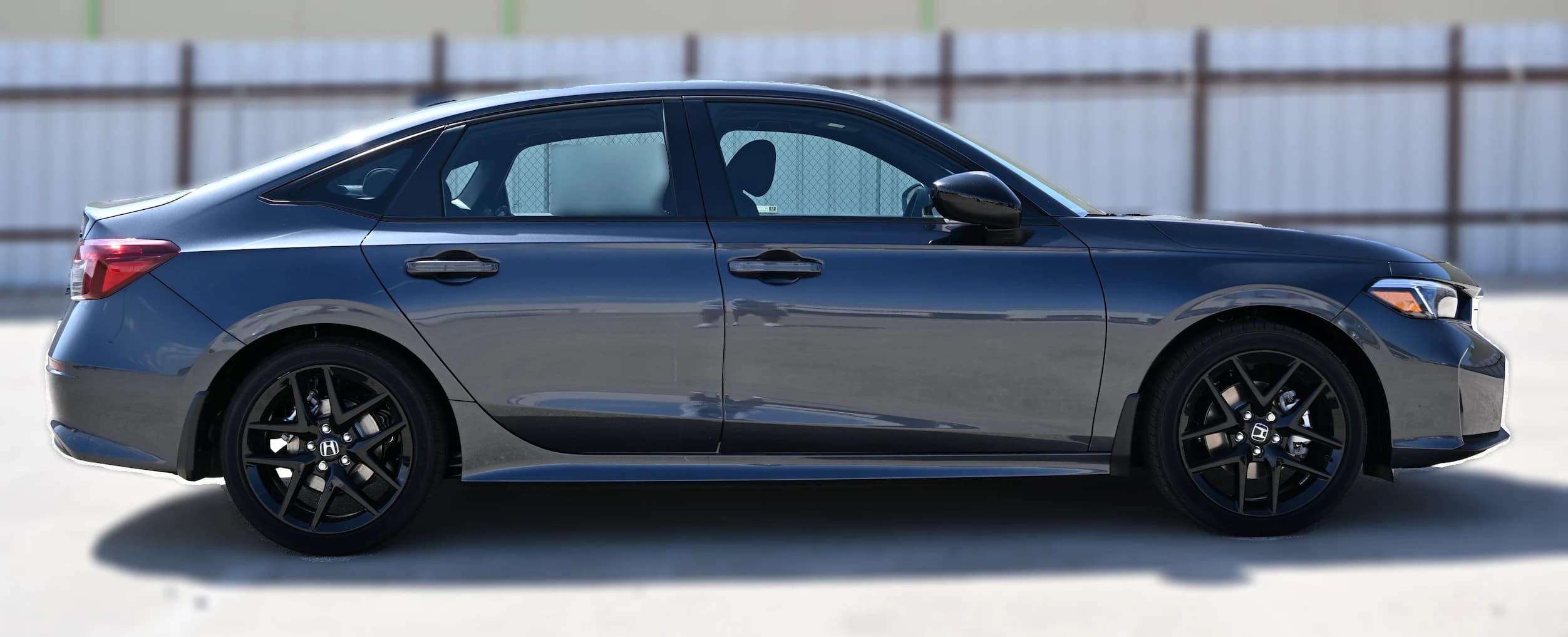 Honda Civic Sedan Hybrid Sport CVT 2026 — side view