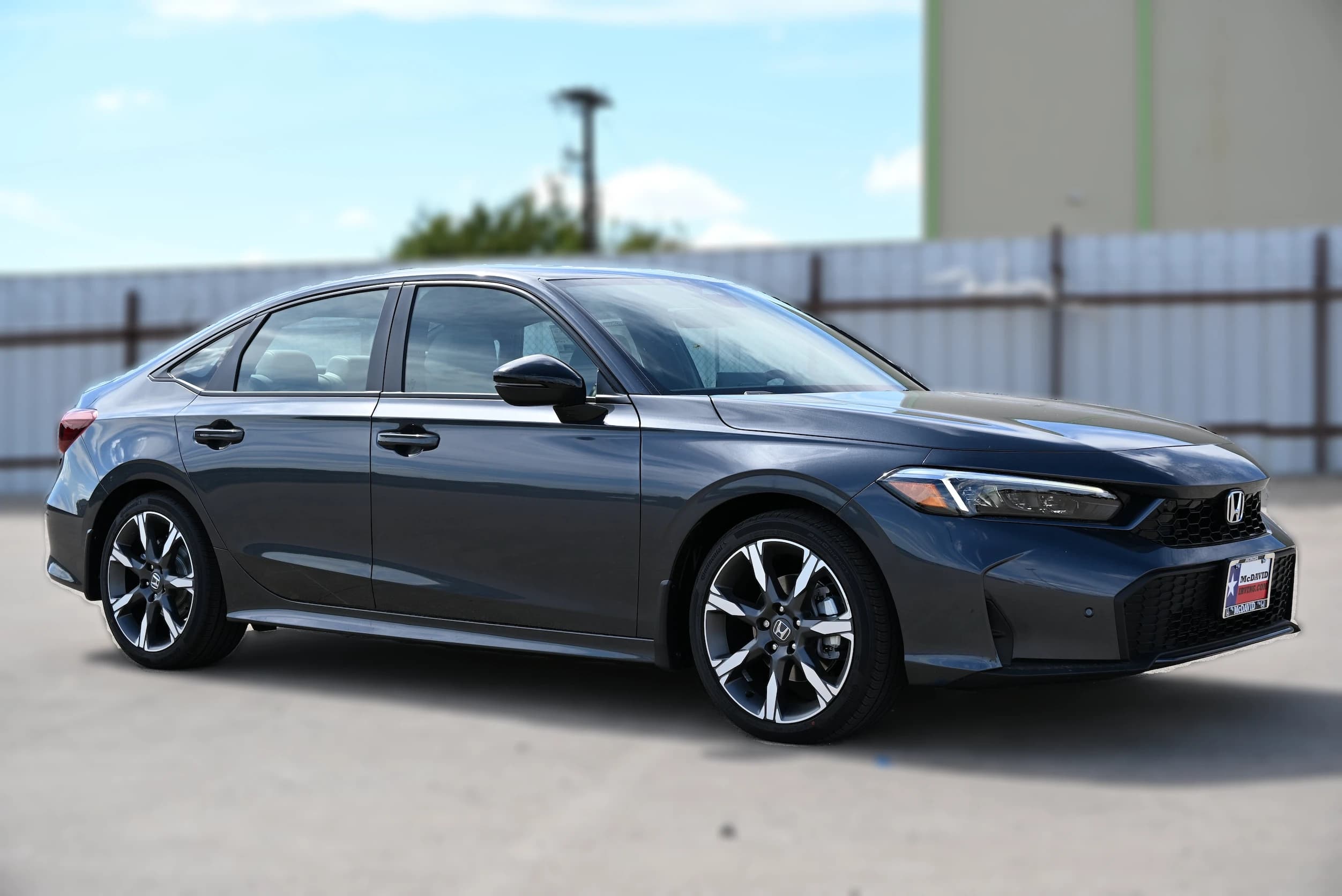Honda Civic Sedan Hybrid Sport CVT 2026 — side view