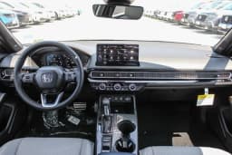 Honda Civic Sedan Hybrid Sport Touring CVT 2026 — side view