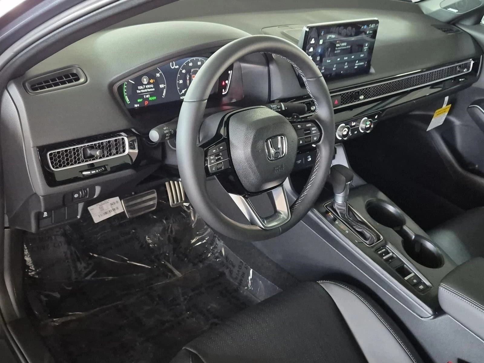 Honda Civic Sedan Hybrid Sport Touring CVT 2026 — side view