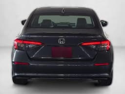 Honda Civic Sedan Hybrid Sport Touring CVT 2026 — side view