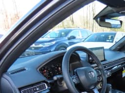 Honda Civic Sedan Hybrid Sport Touring CVT 2026 — side view