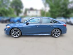 Honda Civic Sedan Hybrid Sport Touring CVT 2026 — side view