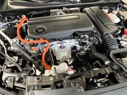 Honda Civic Sedan Hybrid Sport Touring CVT 2026 — side view