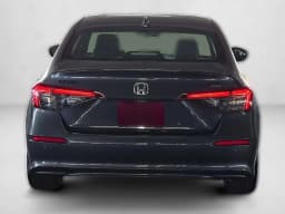 Honda Civic Sedan Hybrid Sport Touring CVT 2026 — side view