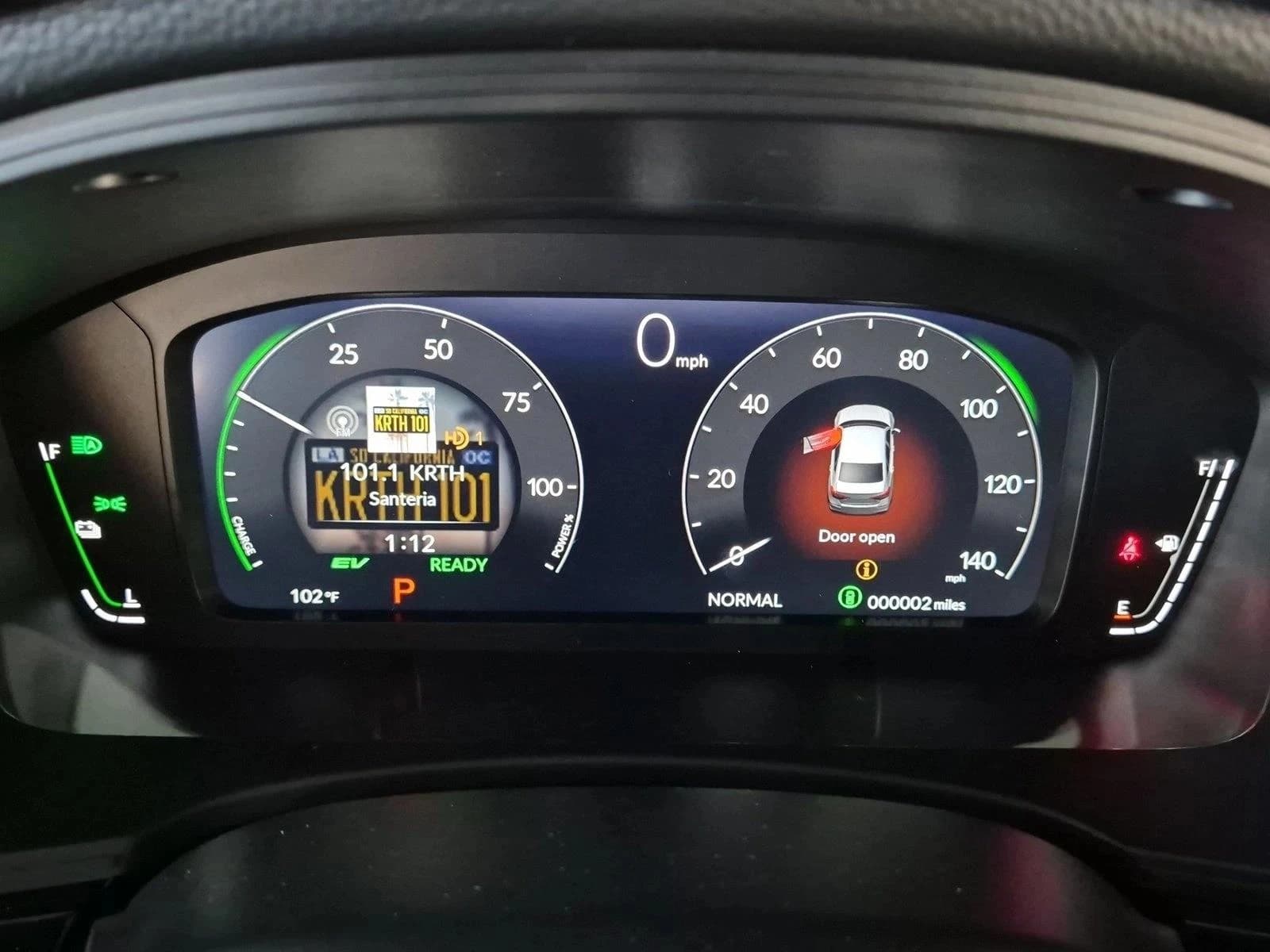 Honda Civic Sedan Hybrid Sport Touring CVT 2026 — side view