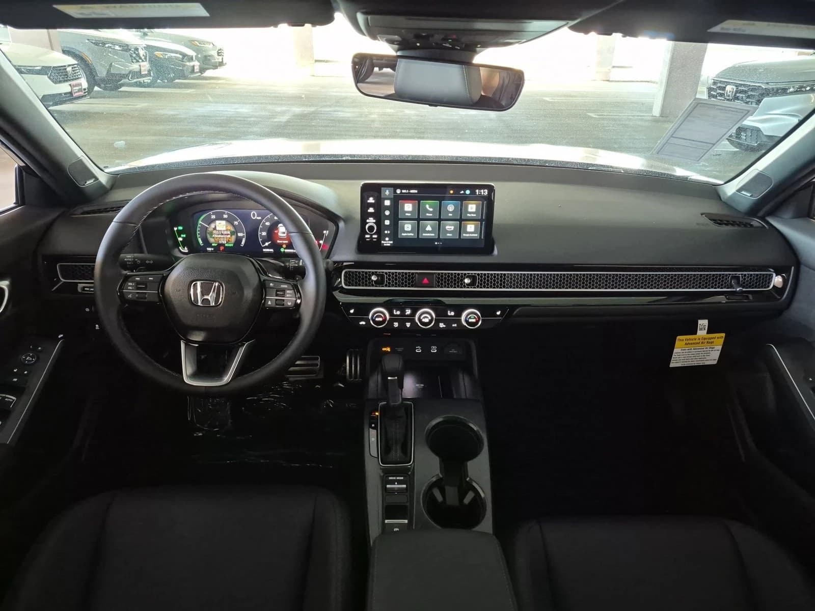 Honda Civic Sedan Hybrid Sport Touring CVT 2026 — side view