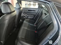 Honda Civic Sedan Hybrid Sport Touring CVT 2026 — side view