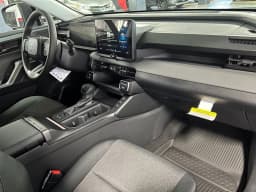 Toyota RAV4 LE AWD (Natl) 2026 — side view