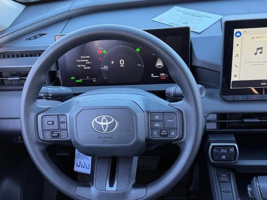 Toyota RAV4 LE AWD (Natl) 2026 — side view