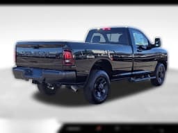 Ram 3500 Tradesman 4x4 Reg Cab 8' Box 2026 — side view