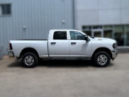 Ram 3500 Tradesman 4x4 Crew Cab 6'4" Box 2026 — side view