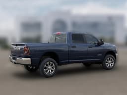 Ram 3500 Big Horn 4x4 Crew Cab 6'4" Box 2026 — side view