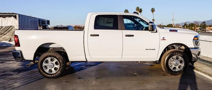 Ram 3500 Big Horn 4x4 Crew Cab 6'4" Box 2026 — side view