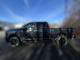 Ram 3500 Big Horn 4x4 Crew Cab 6'4" Box 2026 — side view