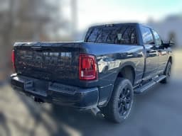 Ram 3500 Big Horn 4x4 Crew Cab 6'4" Box 2026 — side view