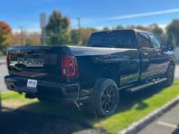 Ram 3500 Big Horn 4x4 Crew Cab 8' Box 2026 — side view