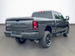 Ram 2500 Black Express 4x4 Crew Cab 6'4" Box 2026 — side view