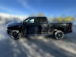 Ram 2500 Black Express 4x4 Crew Cab 6'4" Box 2026 — side view