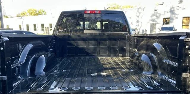 Ram 2500 Black Express 4x4 Crew Cab 6'4" Box 2026 — side view