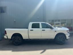 Ram 2500 Black Express 4x4 Crew Cab 6'4" Box 2026 — side view