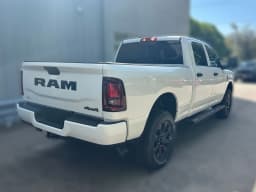 Ram 2500 Black Express 4x4 Crew Cab 6'4" Box 2026 — side view