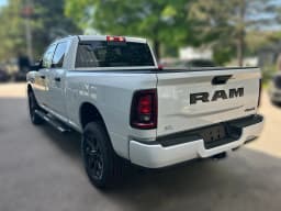 Ram 2500 Black Express 4x4 Crew Cab 6'4" Box 2026 — side view