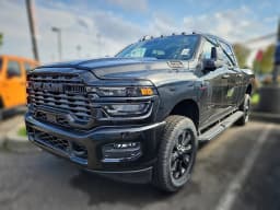 Ram 2500 Big Horn 4x4 Crew Cab 6'4" Box 2025 — side view