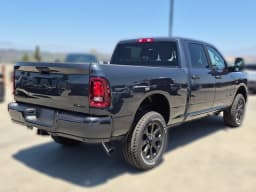 Ram 2500 Big Horn 4x4 Crew Cab 6'4" Box 2026 — side view