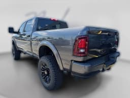 Ram 2500 Big Horn 4x4 Crew Cab 6'4" Box 2026 — side view