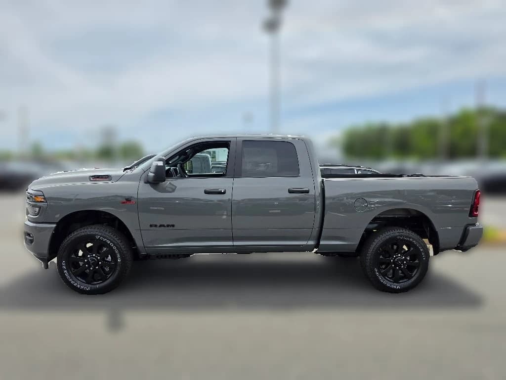 Ram 2500 Big Horn 4x4 Crew Cab 6'4" Box 2026 — side view