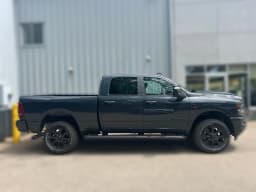 Ram 2500 Big Horn 4x4 Crew Cab 6'4" Box 2026 — side view