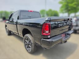 Ram 2500 Big Horn 4x4 Crew Cab 6'4" Box 2026 — side view