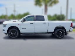 Ram 2500 Big Horn 4x4 Crew Cab 6'4" Box 2026 — side view
