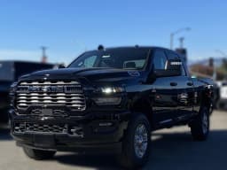 Ram 2500 Big Horn 4x4 Crew Cab 6'4" Box 2026 — side view