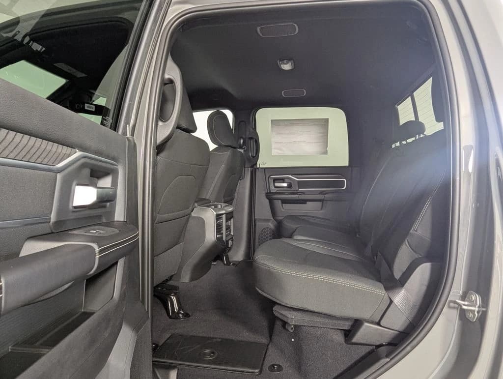 Ram 2500 Big Horn 4x4 Crew Cab 6'4" Box 2026 — side view