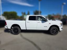 Ram 2500 Laramie 4x4 Crew Cab 6'4" Box 2026 — side view