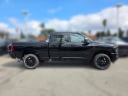 Ram 2500 Laramie 4x4 Crew Cab 6'4" Box 2026 — side view