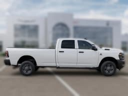 Ram 2500 Tradesman 4x4 Crew Cab 8' Box 2027 — side view