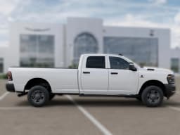 Ram 2500 Tradesman 4x4 Crew Cab 8' Box 2027 — side view